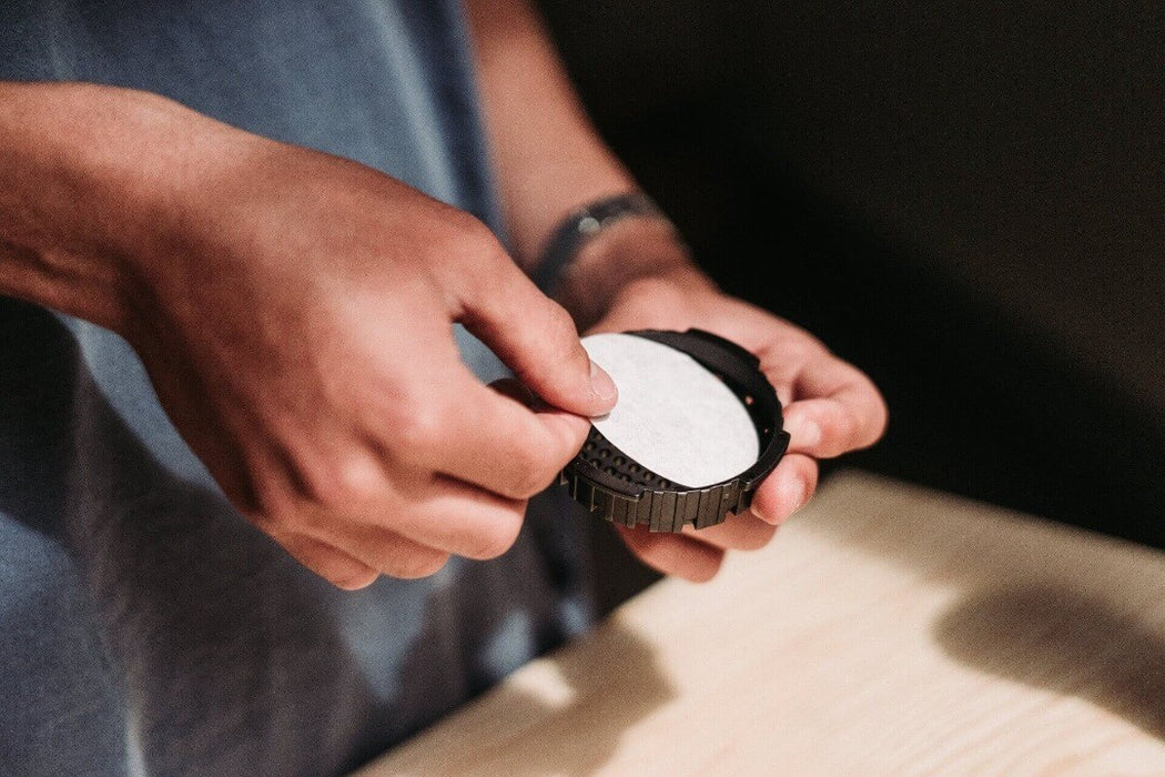 Putting Aeropress filter paper into aeropress
