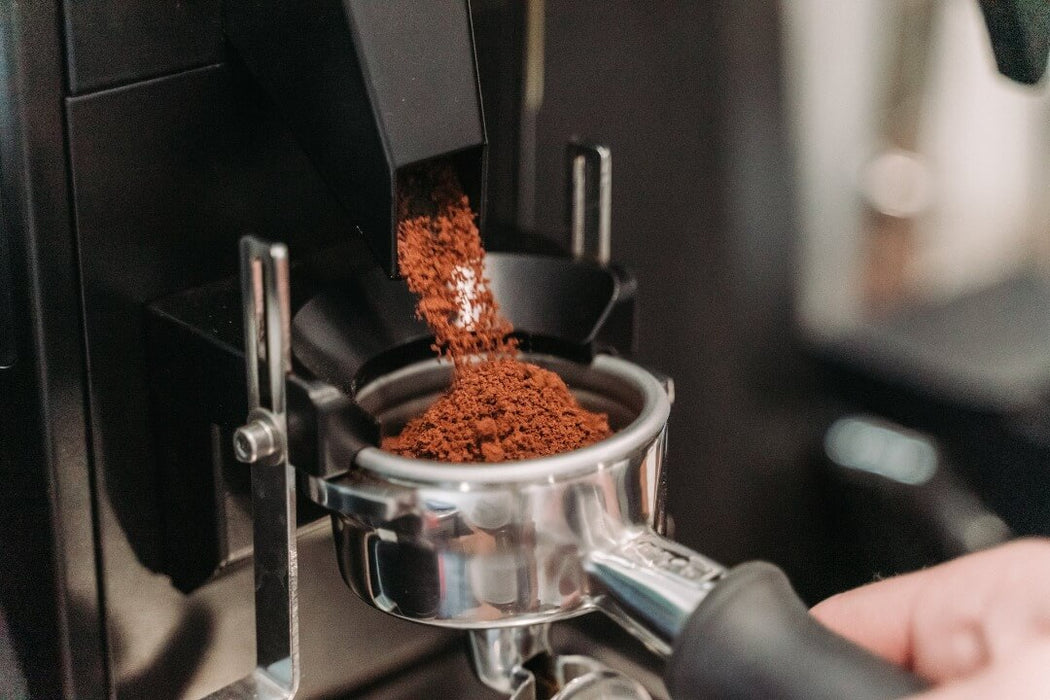 Grinding Headlands coffee on grinder